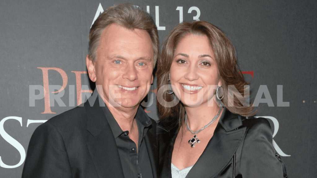 Couple posing at a premiere event.